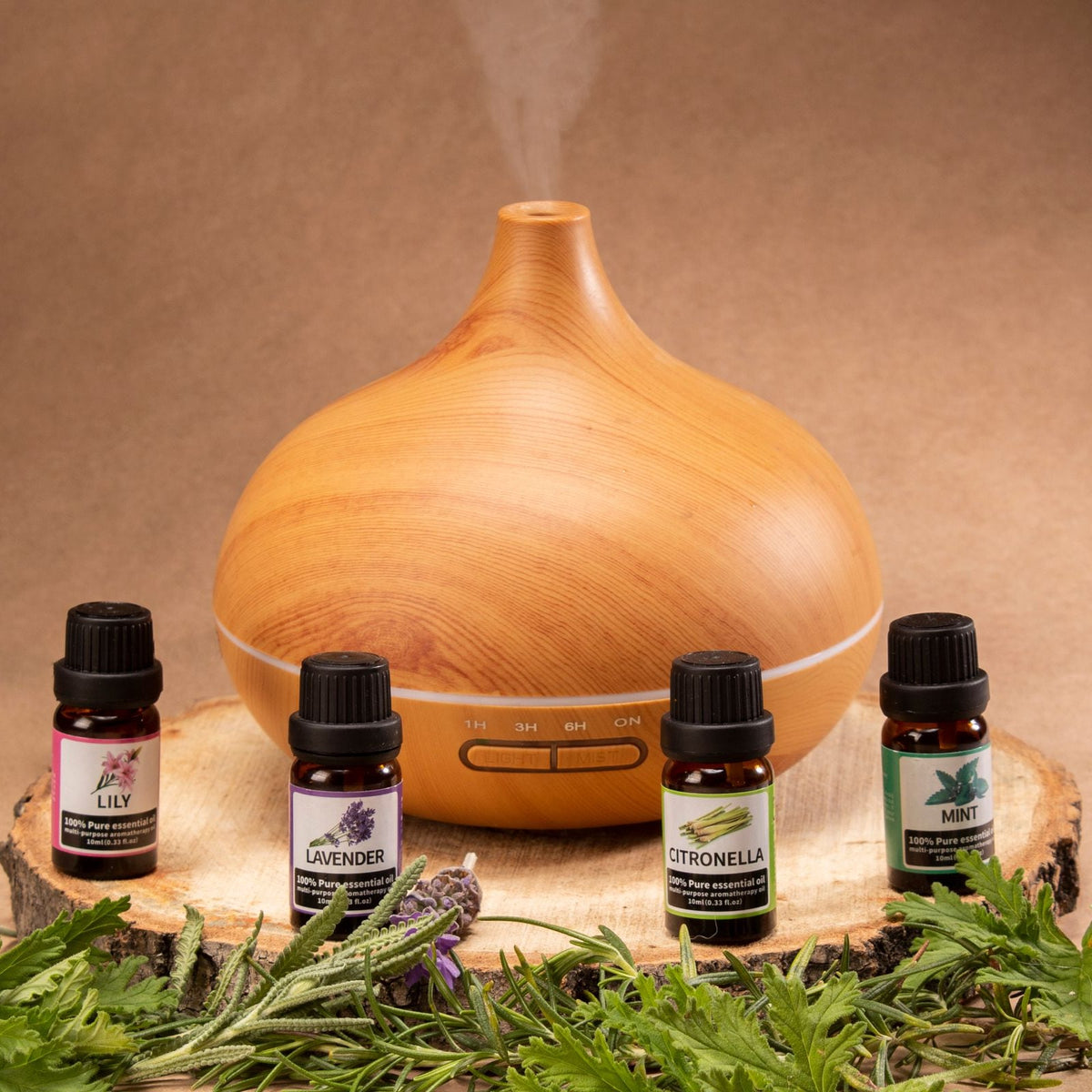 Hushwood diffuser in light wood-grain, misting, with a row of aroma oils