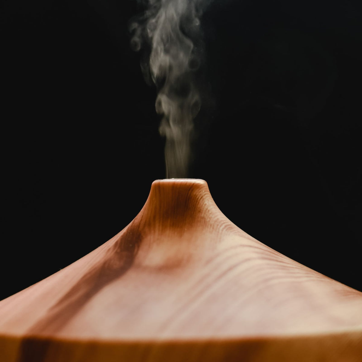 Close-up of cool mist rising from the diffuser outlet